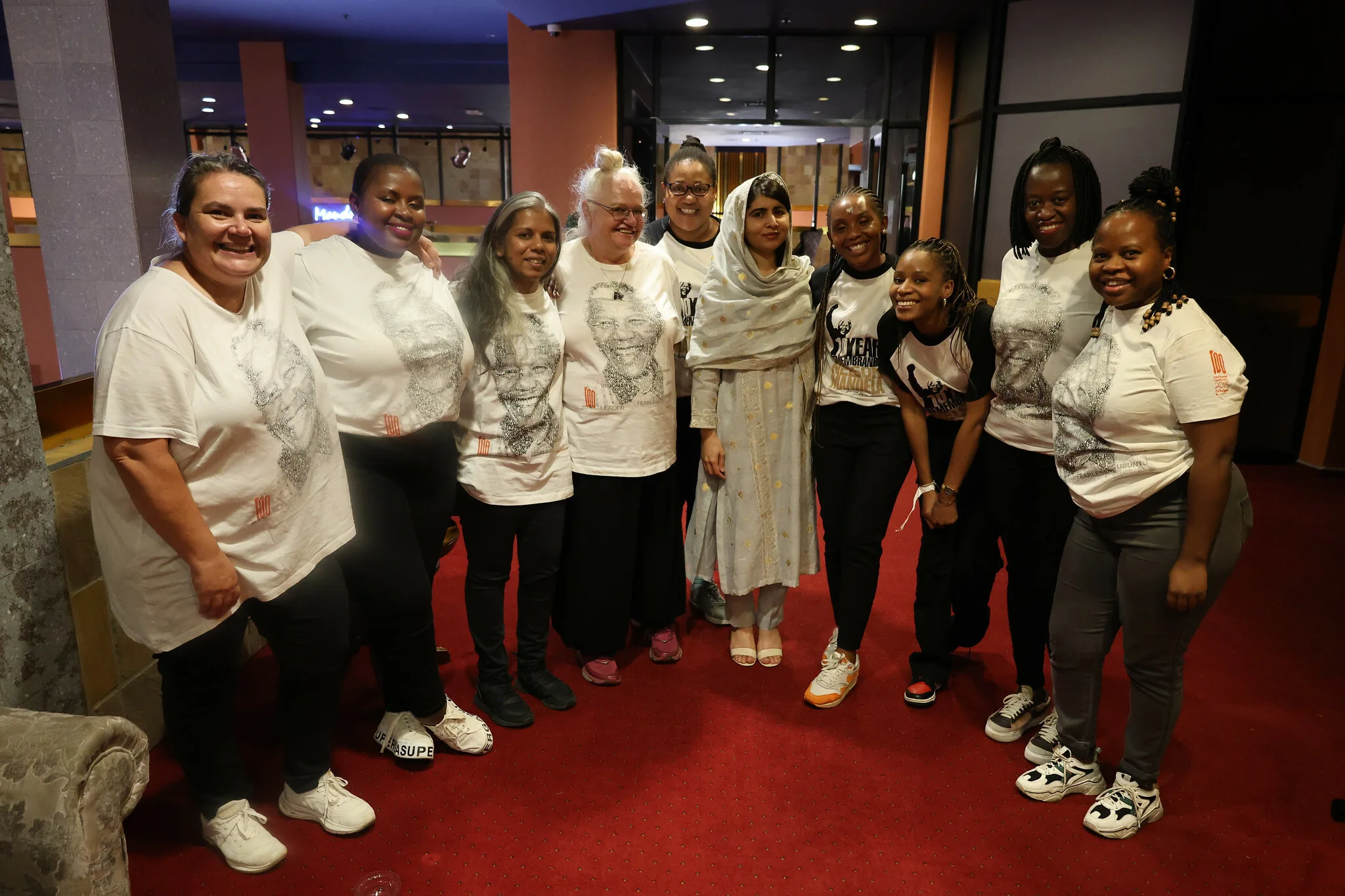 Malala Yousafzai and the Flow Communications team at the 21st Nelson Mandela Annual Lecture 2023