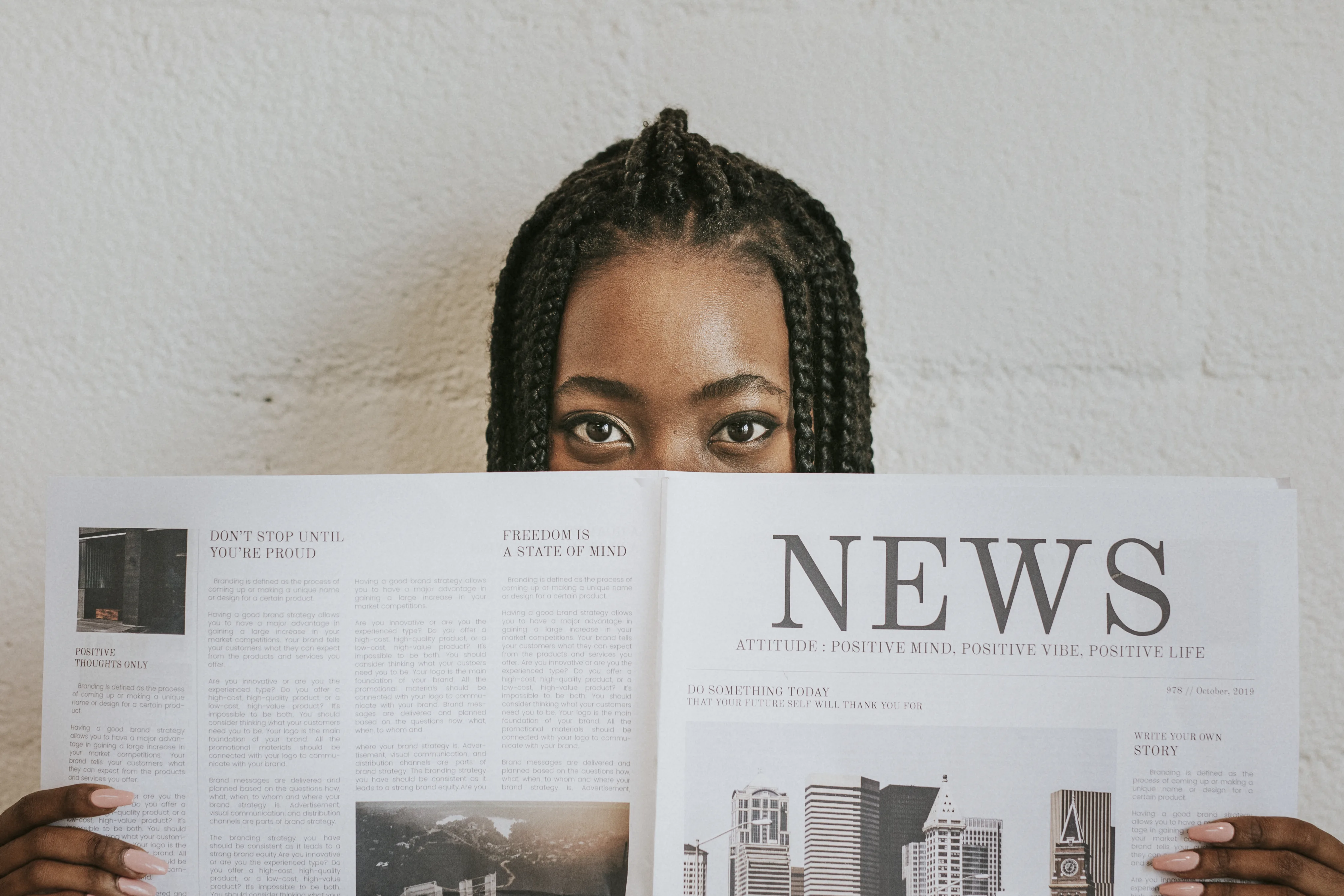 Woman reading newspaper 2025 02 10 12 58 13 utc 1
